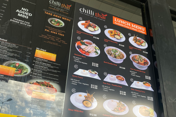 Printed vinyl Thai menu installed on external glass of restaurant
