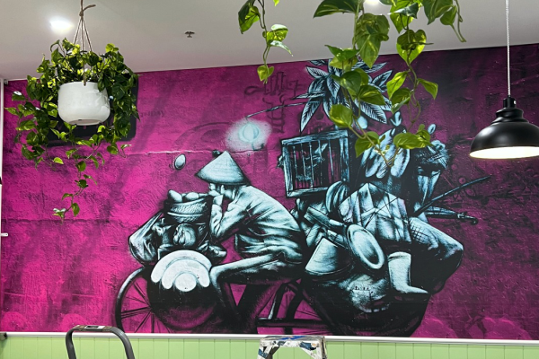 Pink background with hand drawn Vietnamese man on bike image wallpaper