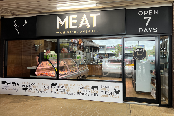 image of front of a butchers shop showing their signage