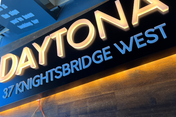 Glowing letters in a black lightbox