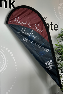 Tear drop banner with branded writing, maroon and blue colours